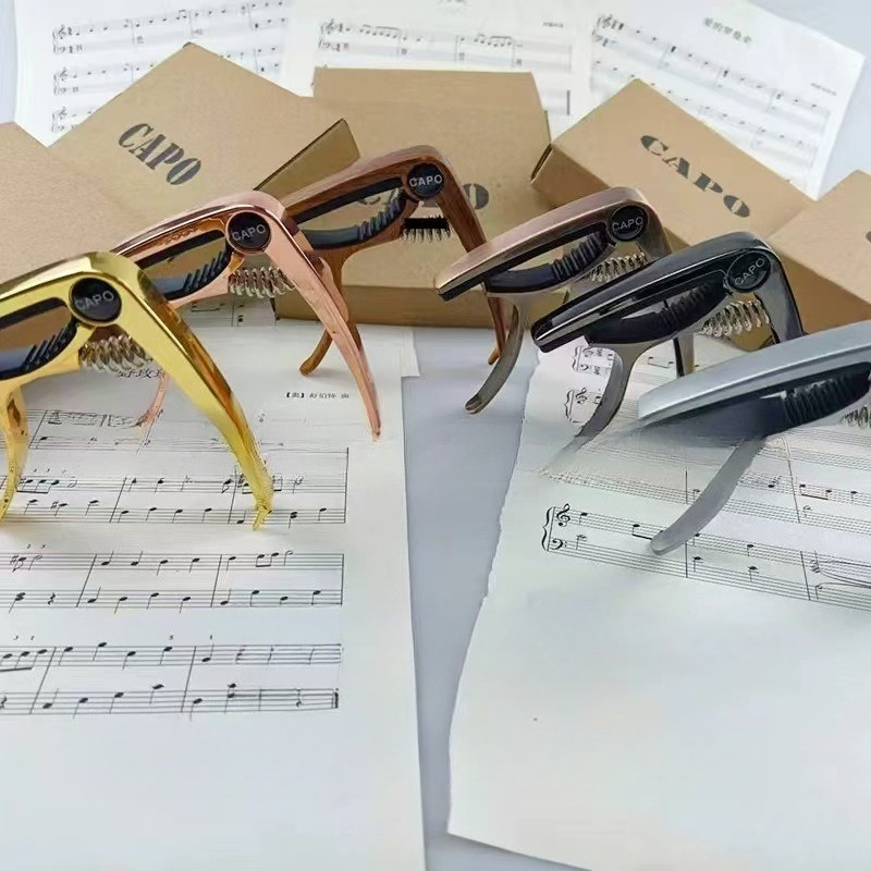 Musical Instrument Guitar Capo - Musical Instrument Ending In A review and price