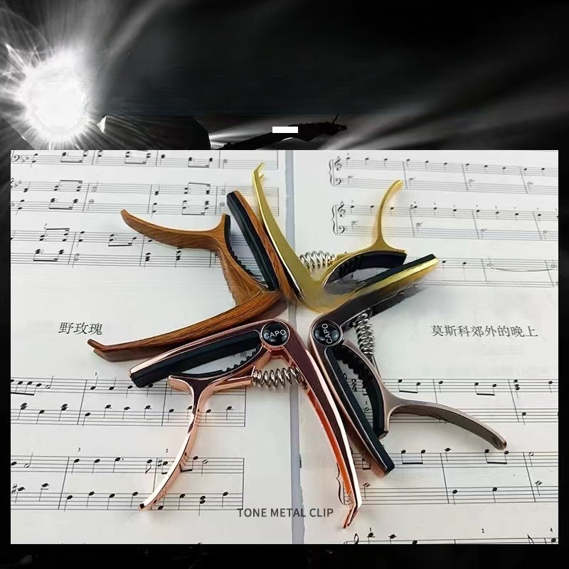 Musical Instrument Guitar Capo - Musical Instrument Ending In A review and price